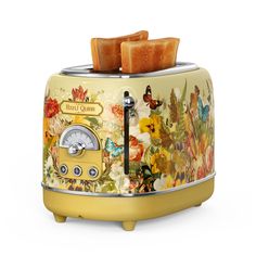 a toaster that has some slices of bread on it and is decorated with flowers