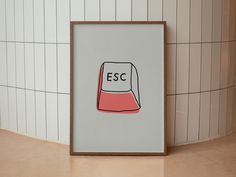 an image of a poster with the word esc on it next to a tiled wall