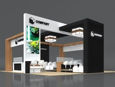 an exhibition stand with white and black furniture