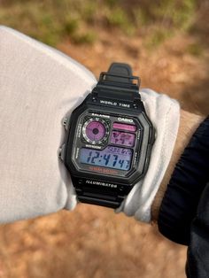 Elevate your style with the Purple Nebula, a meticulously customized Casio AE1200 featuring bold purple accents that exude a cosmic, retro-futuristic vibe. This unique watch is perfect for collectors, Casio enthusiasts, or anyone seeking a standout accessory. 🌌 Key Features: * Cosmic Design: Striking purple accents inspired by the mysteries of deep space. * World Time Functionality: Includes an analog-style map display for global time zones. * 10-Year Battery Life: Reliable and long-lasting performance. * 100M Water Resistance: Built for everyday adventures. * Illuminator Backlight: Ensures clear visibility, even in the dark. ⚙️ Specifications: * Model: Casio AE1200 (Customized). * Color Scheme: Black base with vibrant purple accents. * Packaging: Comes in the original Casio box, perfect Casio Ae1200, Map Display, Purple Nebula, Space World, Cosmic Design, Purple Accents, Vibrant Purple, Time Zones