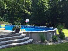 an above ground pool with steps leading up to it