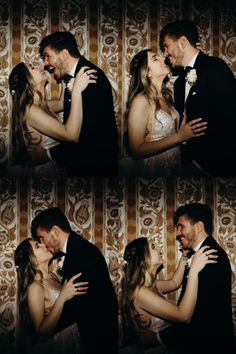 a couple kissing each other in front of a wallpapered background with gold stripes