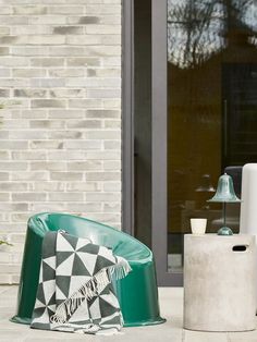 some white and green furniture sitting on the ground