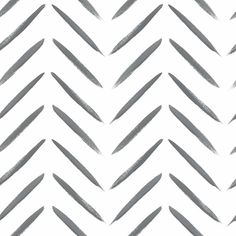 an abstract chevron pattern in grey and white