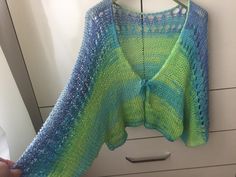 Bohemian V-neck Summer Sweater, Open Knit Shrug For Summer Beach, Open Knit Summer Shrug For Beach, Summer Beach Open Knit Shrug, Crochet Long Sleeve Summer Shrug, Summer Crochet Long Sleeve Shrug, Casual Green Summer Sweater, Long Sleeve Crochet Shrug For Summer, Green V-neck Open Knit Sweater