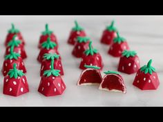 chocolate covered strawberries with green leaves on them