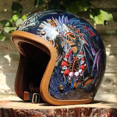 a motorcycle helmet sitting on top of a tree stump