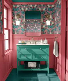 a bathroom with pink walls and green vanity