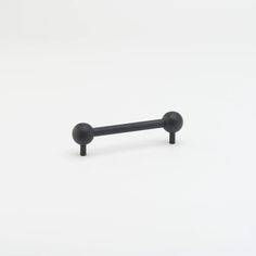 an image of a black door handle on a white background