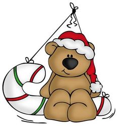 a brown teddy bear wearing a santa hat and sitting next to a life preserver