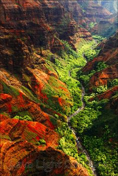 an aerial view of a river running through a canyon