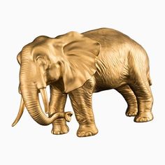 an elephant is standing in front of a white background and has gold paint on it's body