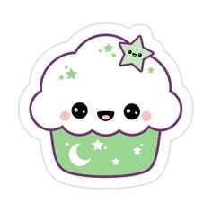 a green cupcake with stars and moon on it's top, sitting in front of a white background