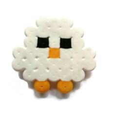 a white sheep with black eyes and orange feet on it's back legs is standing in front of a white background