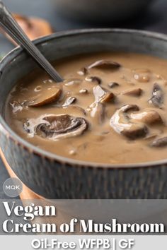 a bowl of soup with mushrooms in it