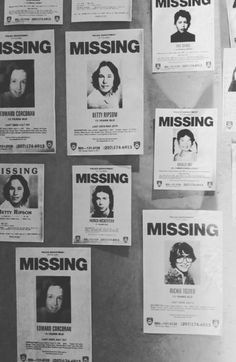 several missing posters are hanging on the wall