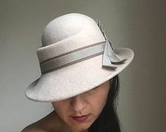 Ivory Felt Cloche Hat Winter Cloche Hat Flower Cloche Hat | Etsy Winter Cream Fitted Fedora, Fitted Beige Brimmed Felt Hat, Elegant Cream Felt Hat For Winter, Elegant White Felt Hat For Winter, Elegant Beige Wool Felt Hat, Cream Short Brim Felt Hat For Kentucky Derby, Fitted Beige Cloche Hat, Elegant Adjustable Felt Top Hat, Elegant White Fedora For Winter