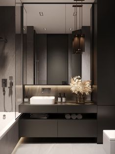 a bathroom with a sink, mirror and bathtub