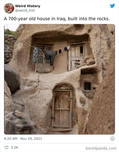 an adobe house built into the side of a mountain