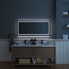 a bathroom vanity with a large mirror above it