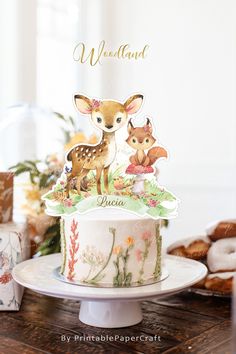 there is a cake decorated with animals on it