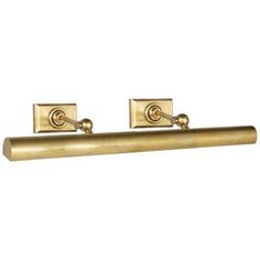 an image of two brass handles on a white background