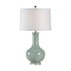 a blue lamp with a white shade on it