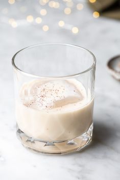 a glass bowl filled with pudding on top of a table