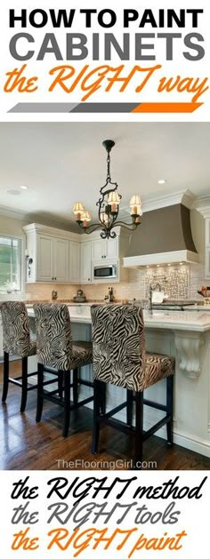 a kitchen with white cabinets and zebra print chairs in front of an island countertop