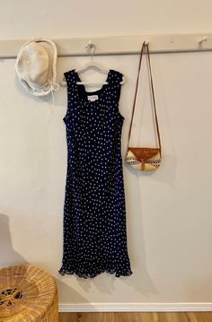 Ankle length silk dress. Navy blue with white polka dots with ruffle detail on the bottom. Size 16 on the tag with approximate measurements: pit to pit 22 1/2 inches and top to bottom 46 1/2 inches. 2 piece set on tag but only dress for sale. Polka Dot One Piece, Heavy Coat, J G, Dress Navy Blue, 90s Dress, One Piece Dress, Dress For Sale, Piece Dress, Anime Films