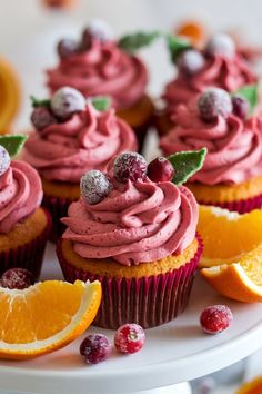 Cranberry Orange Cupcakes with Tangy Cranberry Frosting Cranberry Buttercream Frosting, Cranberry Frosting Recipe, Pumpkin Cranberry Cupcakes, Orange Cranberry Cupcakes, Elegant Christmas Cupcakes, Fall Flavored Cupcakes, Cranberry Orange Cupcakes Holidays, Cranberry Frosting, Recipes With Fresh Cranberries