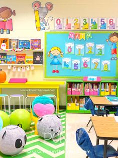 a classroom with desks, chairs and stuffed animals on the floor in front of colorful bookshelves