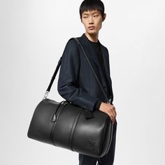 LOUIS VUITTON® - Keepall Bandoulière 50 - Black Designer Travel Bags, Luxury Travel Bag, Louis Vuitton Keepall 50, Louis Vuitton Sac, Crocodile Bags, Louis Vuitton Keepall, Louis Vuitton Official, Men's Bags, Mens Luxury