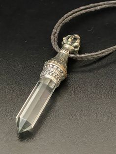 Pendant Quartz Crystal Silver Decorated Ornate Cap. Portable Wand, Crystal Wand Talking Stick, Energy Wand,  Energy is Known to capture itself in Crystal, Crystals are holders of the unknown, Yet for some Very well Known. Total Length Crystal and Cap 3 1/4" Artist John Binzley  In truth, his artwork is an ever-changing, ever-evolving merging of the cultures that he experiences and combines with his own artistic visions. His collectors eagerly await to see what he will be displayed in his yearly Hair Horn, Talking Stick, Wand Crystal, Queen Jewelry, Engraved Crystal, Pacific Grove, Crystal Wand, Fantasy Jewelry, The Unknown