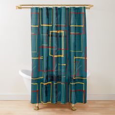 a blue shower curtain with red, yellow and green squares on the bottom in front of a white bathtub