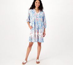 Who says summer has to be all shorts and tees? (Not us!) Mix up your fun-in-the-sun mojo with this pretty printed dress boasting a frilly ruffle trim. Its elevated yet relaxed style fits right in with your minimal effort plans without sacrificing warm-weather comfort. What can we say -- one-piece dressing is one-derful! From the Tolani Collection. Spring V-neck Beach Dress, Casual V-neck Sundress For Summer Outings, Spring Beachwear Dresses With Ruffles, Tiered Summer Dress For Vacation, Tiered Summer Vacation Dresses, Summer Sundress With Ruffle Hem For Daywear, Spring Daywear Sundress With Relaxed Fit, Summer Dresses With Ruffles In Relaxed Fit, Spring Sundress With Relaxed Fit For Daywear