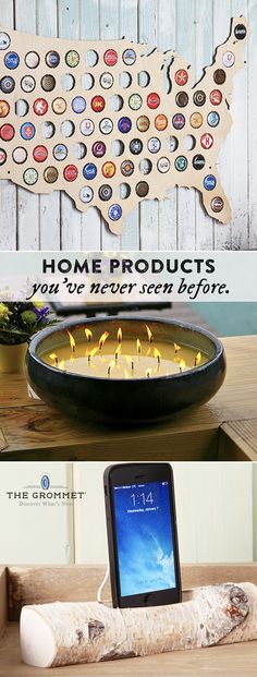 a cell phone sitting on top of a wooden table next to a bowl filled with candles