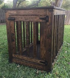 a wooden crate sitting in the grass