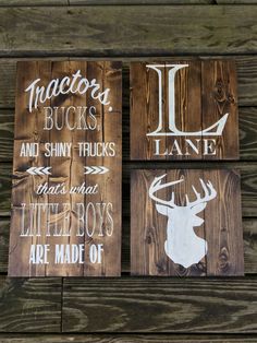 three wooden signs with different types of deer heads on them, one is white and the other is brown