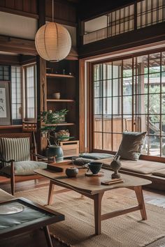 a living room filled with furniture and lots of windows