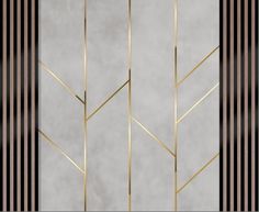 an art deco door with gold and black lines on the front, along with a marble background