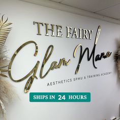 there is a sign that says the fairy glam maa on it with gold lettering