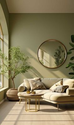 a living room filled with furniture and a large mirror on the wall above it's windows