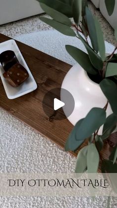 a wooden tray with two chocolates on it