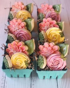 there are many cupcakes with flowers in them