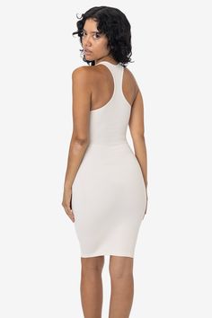 This sporty racerback dress is made of a heavy 2x1 rib with spandex so it has a flattering stretch. This textile features more compression than our regular cotton spandex styles and has been garment dyed and washed, so it is shrink-free, in 3 basic colors for your wardrobe. The mid-length of this dress makes it perfect for wearing day to night and is perfect for spring and summer. Made in Los Angeles, Calif. by sewers who are paid up to $20 an hour or more with benefits and overtime. • 2x1 Rib• Women In White, La Outfits, Black And White Baby, Racerback Dress, Sweaters And Leggings, Basic Colors, Low Cut, Quality Clothing, Cotton Spandex