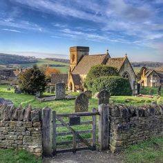 an old stone church in the countryside