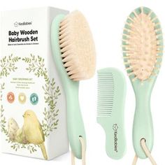 the baby wooden hairbrush set is in front of its box and next to it's brush