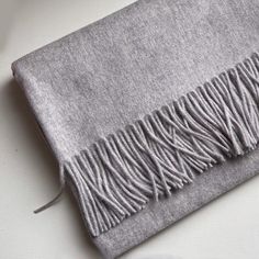 Thick cashmere (100%) scarf is offered in 18 colors. A cold-weather must-have that can be styled in multiple ways. Approximately 71" x 28" Gallery Jewelry, Grey Scarf, Cashmere Scarf, New Shop, Stay Warm, Cold Weather, In Style, Must Haves, Winter Fashion