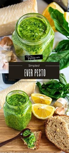 pesto sauce in a jar with bread and lemon slices